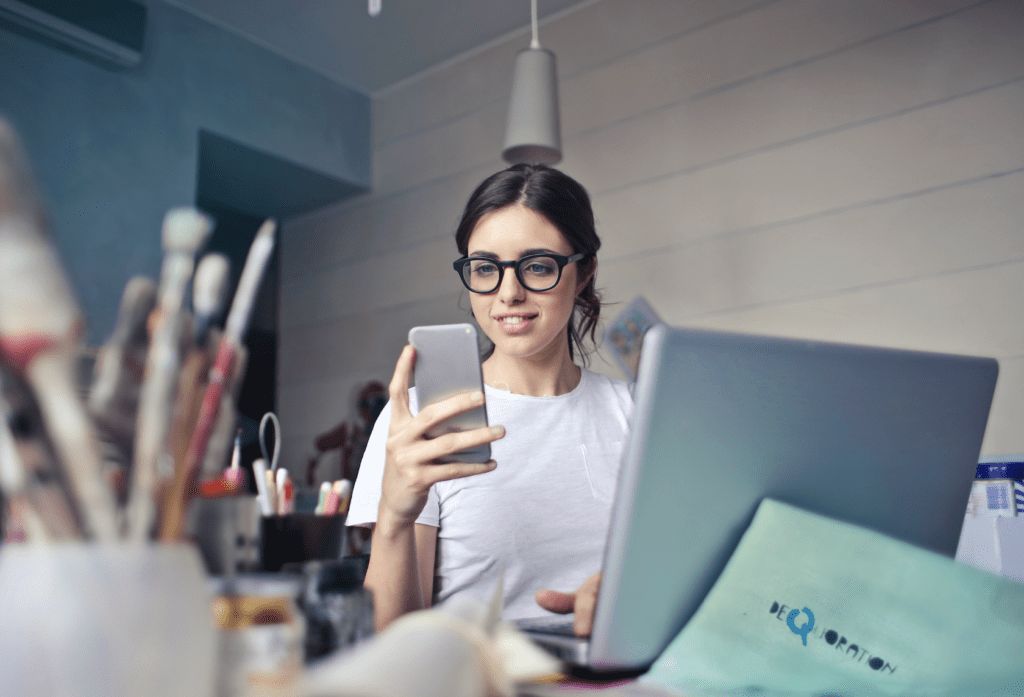 Woman Looking At Laptop Pic