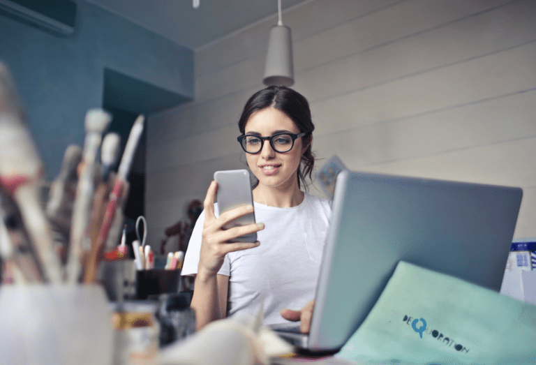 Woman Looking At Laptop Pic